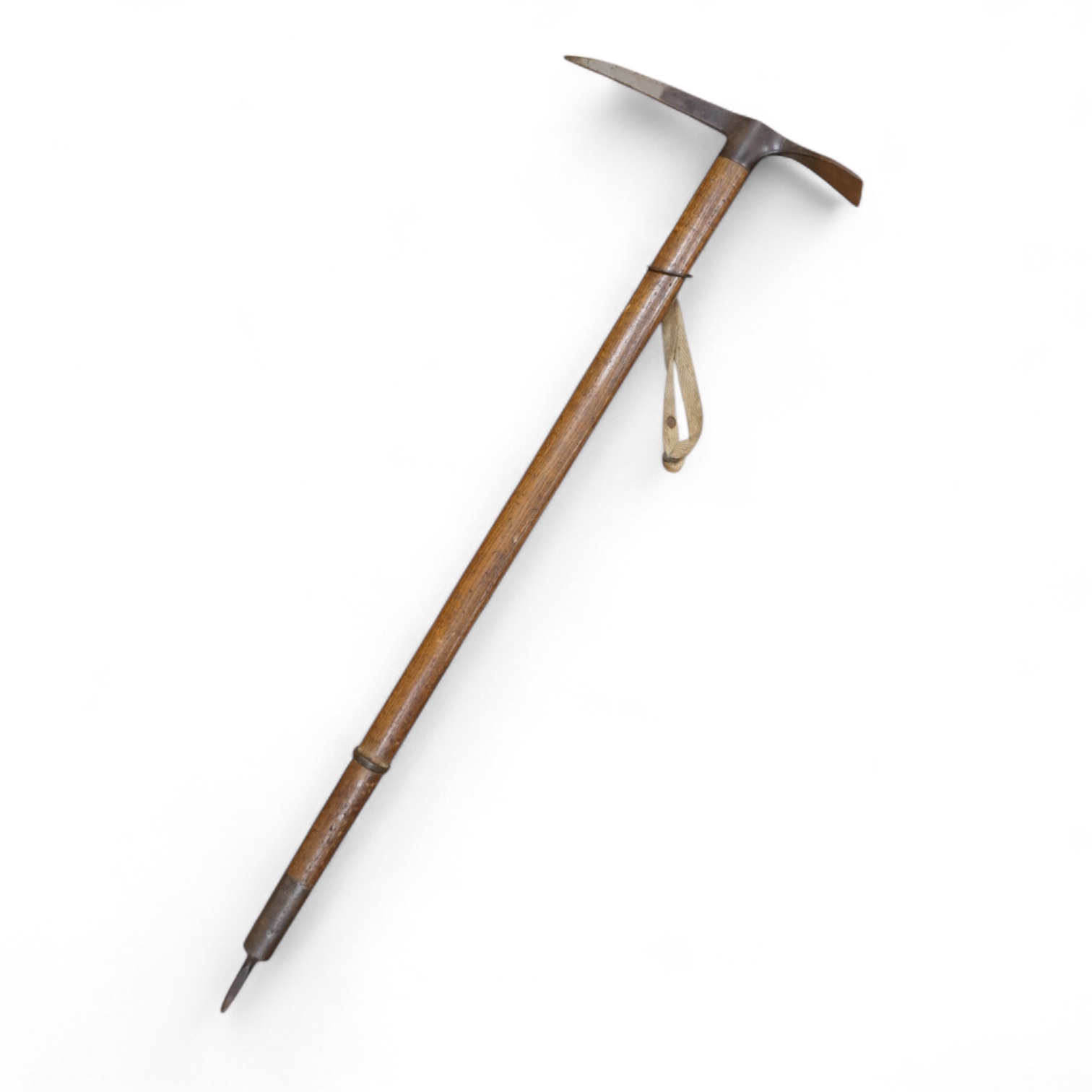 An early 20th century German mountaineer’s ice pick with oak shaft, the head stamped ‘Prima=Garantie Fulpmes’.